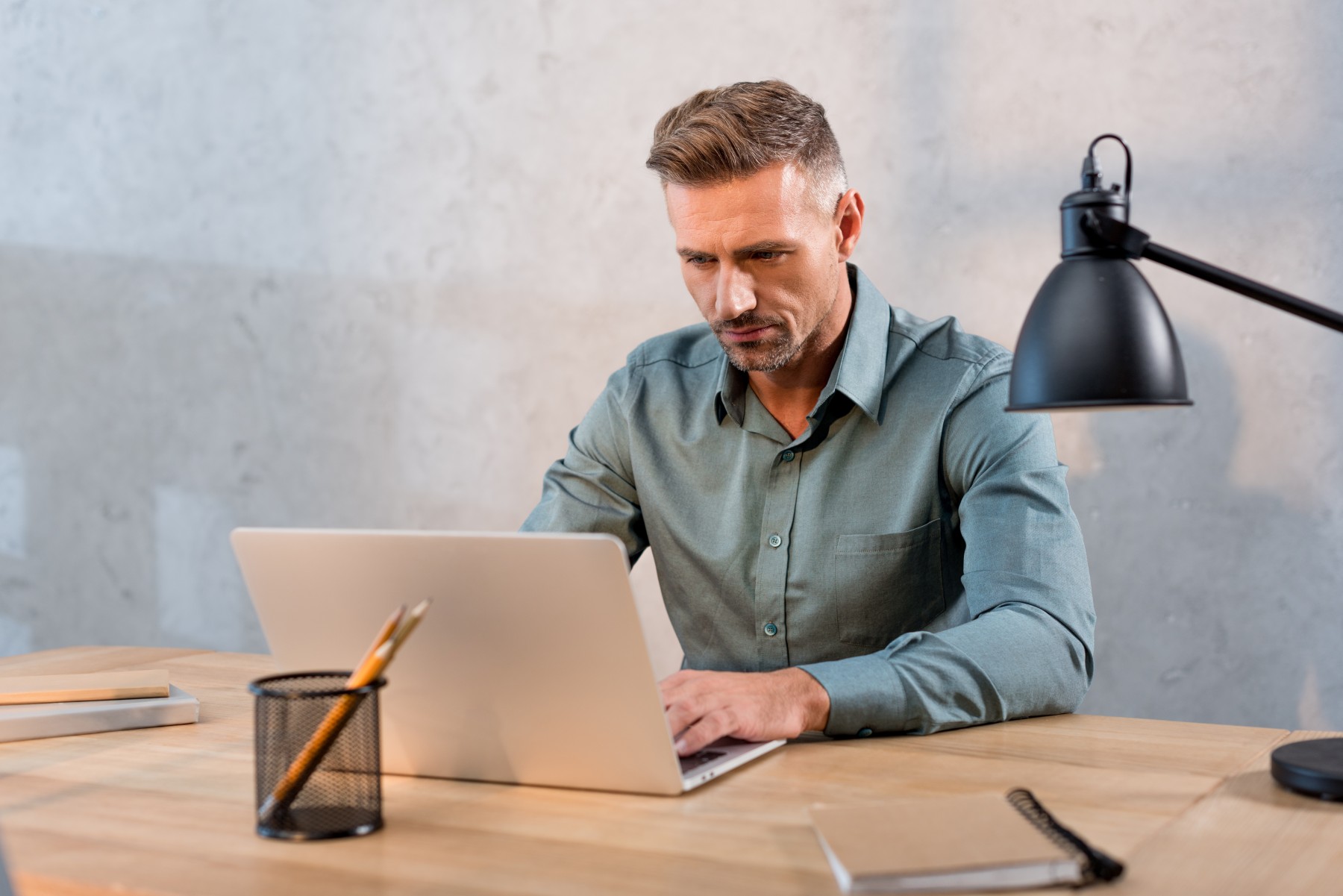Man working on workflows to make business more efficient
